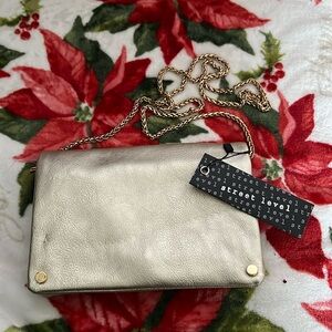 Street level gold cross body purse with gold chain